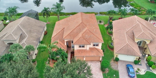 neighborhood with shingle and tile roofs