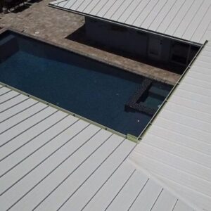 Metal roof covering pool